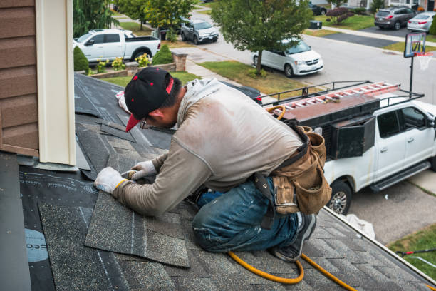Professional Storm Damage Roof Repair technician working in Castleton, VA